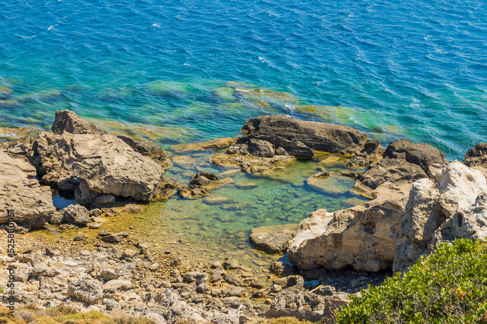Beautiful view of cliff coast on turquoise water background. Beautiful view of cliff coast on turquoise water background.