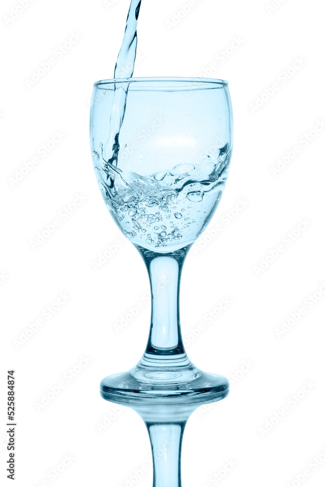 pouring water into glass isolated on white background pouring water into glass isolated on white background