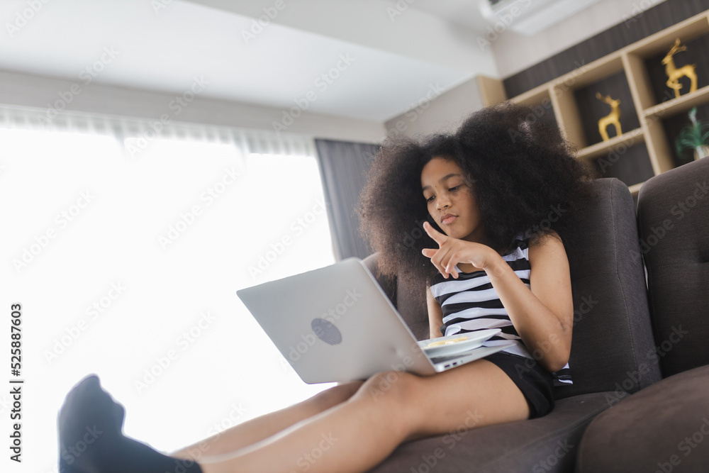 Excited cheerful young Black woman using laptop computer on sofa at home, feeling joy, singing, laughing, happy time, Cute little Girl Study At Home With Laptop And Headphones, Relax concept Excited cheerful young Black woman using laptop computer on sofa at home, feeling joy, singing, laughing, happy time, Cute little Girl Study At Home With Laptop And Headphones, Relax concept