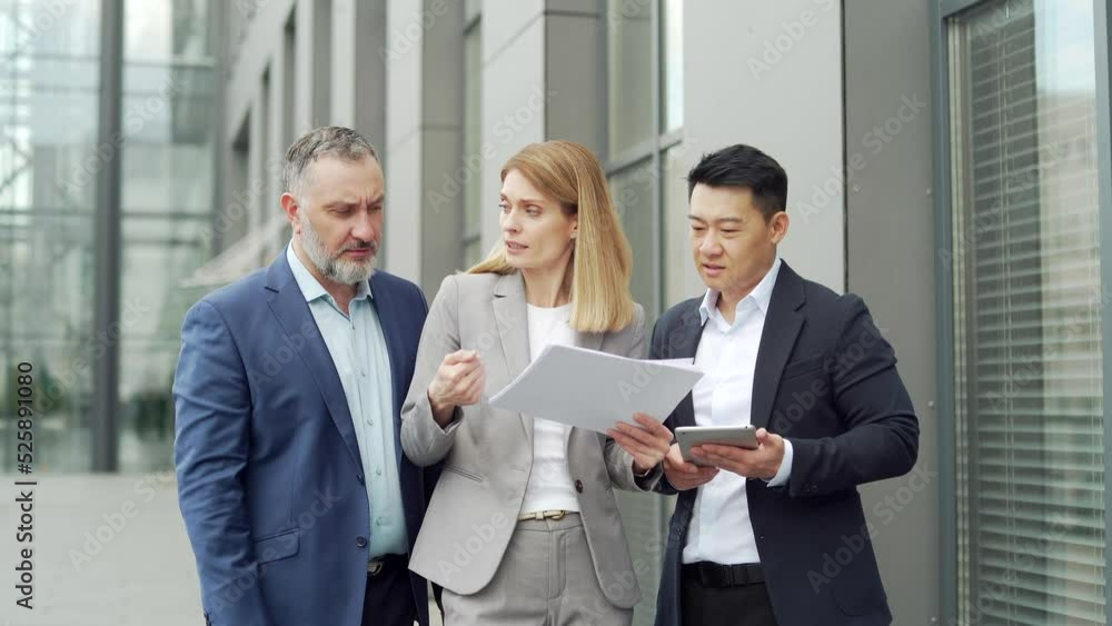 dissatisfied with the results, boss or director quarrels, scolds employees looking at report document Angry manager with bad work financial performance standing with workers outside office building dissatisfied with the results, boss or director quarrels, scolds employees looking at report document Angry manager with bad work financial performance standing with workers outside office building