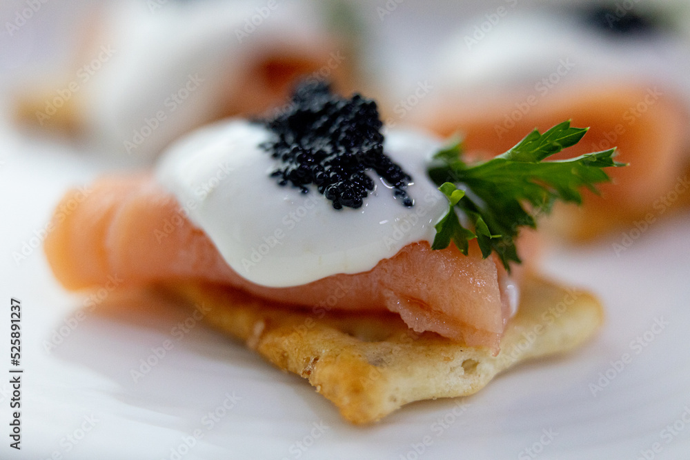 Smoked salmon hors d'oeuvre with caviar Stock Photo | Adobe Stock