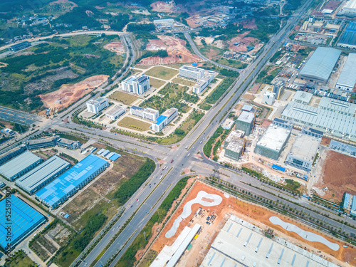Photos Aerial shot of road intersection in urban industrial area