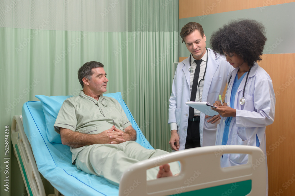 Fototapeta premium Caucasian doctor is examining and consulting to senior patient in hospital.