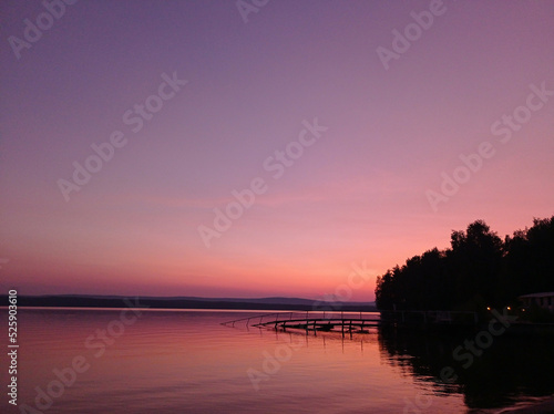 Beautiful pink sunset on the lake. Nature Backgrounds