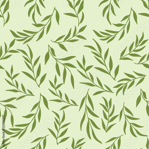 Silhouettes of identical leaves seamless pattern