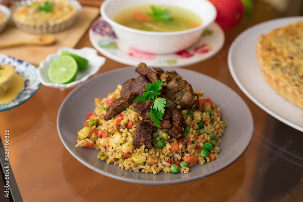 Green rice with meat Buffet table peruvian food gourmet restaurant Green rice with meat Buffet table peruvian food gourmet restaurant