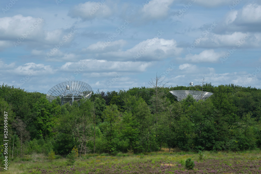 Westerbork, The Netherlands-July 2021; Close up of the dish of Westerbork Synthesis Radio Telescope (WSRT) deployed in linear array built on the site of former WW II Nazi detention and transit camp