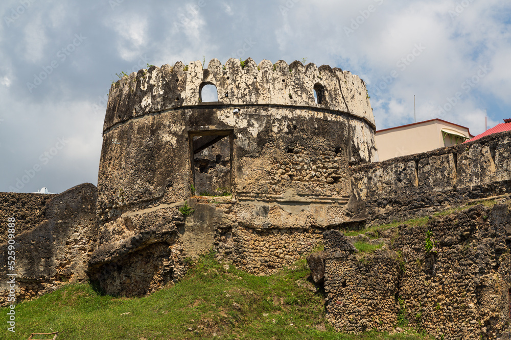 Stone tower and walls of the fortress in Stone Town. Zanzibar, Tanzania