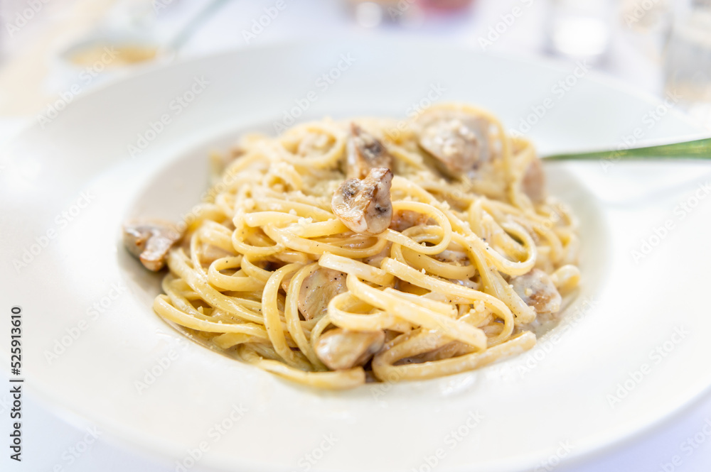Creamy mushroom Spaghetti pasta, Vegan option, served in restaurant Creamy mushroom Spaghetti pasta, Vegan option, served in restaurant