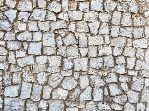 Texture of a stone wall. Old stone wall texture background