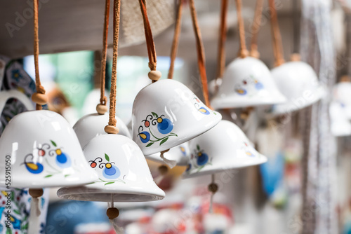 Little bells in a Kashubian composition, a souvenir from the Kashubian region in Poland. photo