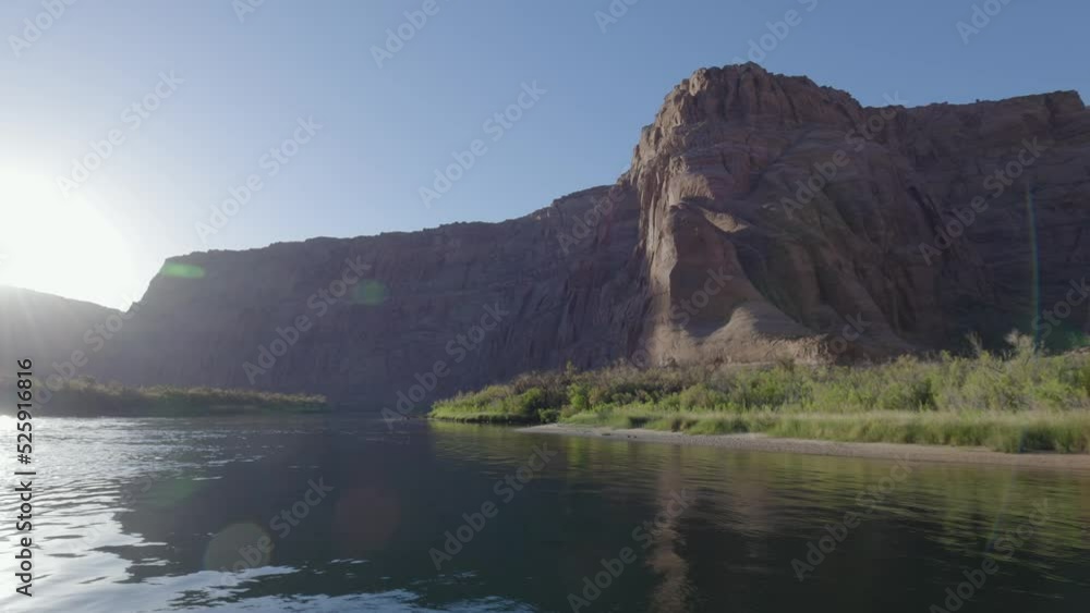 Colorado River in Glen Canyon, Arizona, United States of America. American Mountain Nature Landscape Background. Sunny Sunrise. Slow Motion Colorado River in Glen Canyon, Arizona, United States of America. American Mountain Nature Landscape Background. Sunny Sunrise. Slow Motion