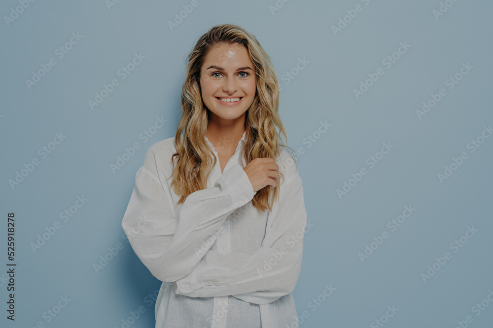 Cheerful young beautiful woman smiling sincerely at camera Cheerful young beautiful woman smiling sincerely at camera