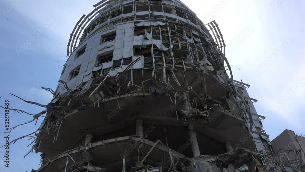 2022 - a modern building is destroyed in central Kharkiv, Ukraine by relentless Russian shelling and rocket attcks during the war in Ukraine. 2022 - a modern building is destroyed in central Kharkiv, Ukraine by relentless Russian shelling and rocket attcks during the war in Ukraine.