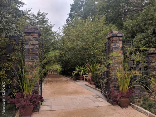 Stone pillar path through the Dorris Duke gardens Durham north Carolina  photo