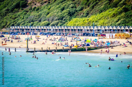 August 24, 2022, Boscombe Beach, Bournemouth, United Kingdom - People on the beach in a very hot summer day, England