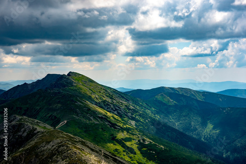 View of the rocky mountain range from the top of Chopok Low Tatras in the background of Mount Dumbier in Slovakia