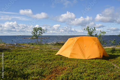 A tent on the seashore.