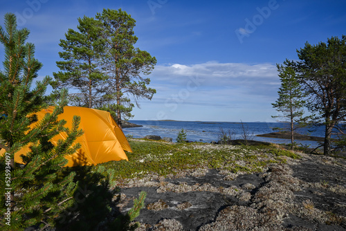 A tent on the seashore.