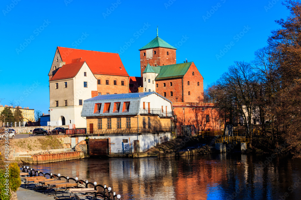 Castle of the Pomeranian Dukes or Darlowo castle on a bank of the Wieprza river in Darlowo, Poland