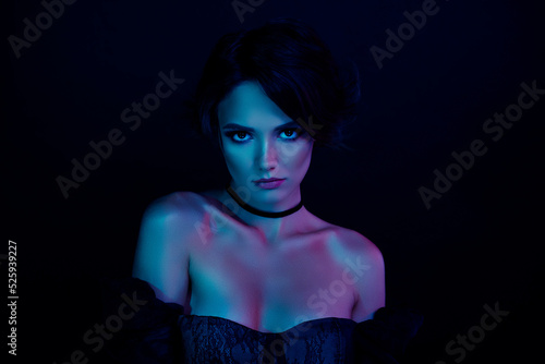 Wallpaper Mural Photo of stunning scary lady zombie in vintage clothes enchant isolated on ultraviolet effect color background Torontodigital.ca