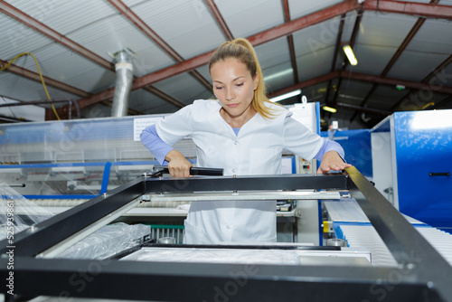 woman operator in a window factory