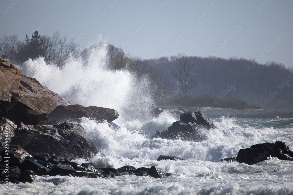 Ocean waves crashing on a rocky shore