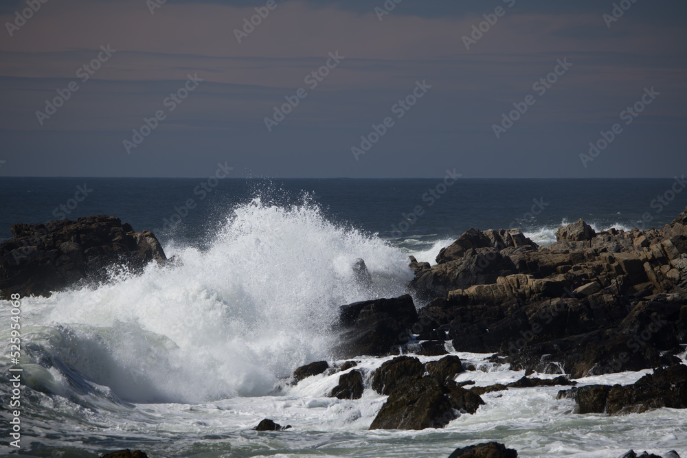 Ocean waves splashing on a rocky shore