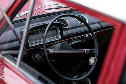 dashboard, car interior, automatic tachometer of an old red car © Евгений Бордовский