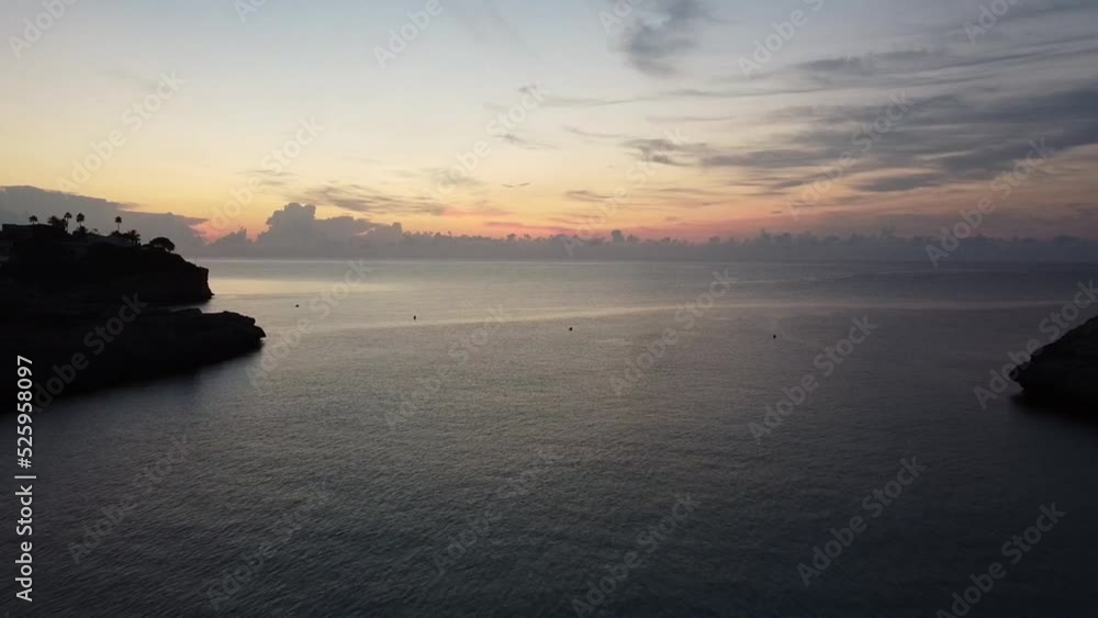 flight over a mediterranean cove at dawn flight over a mediterranean cove at dawn