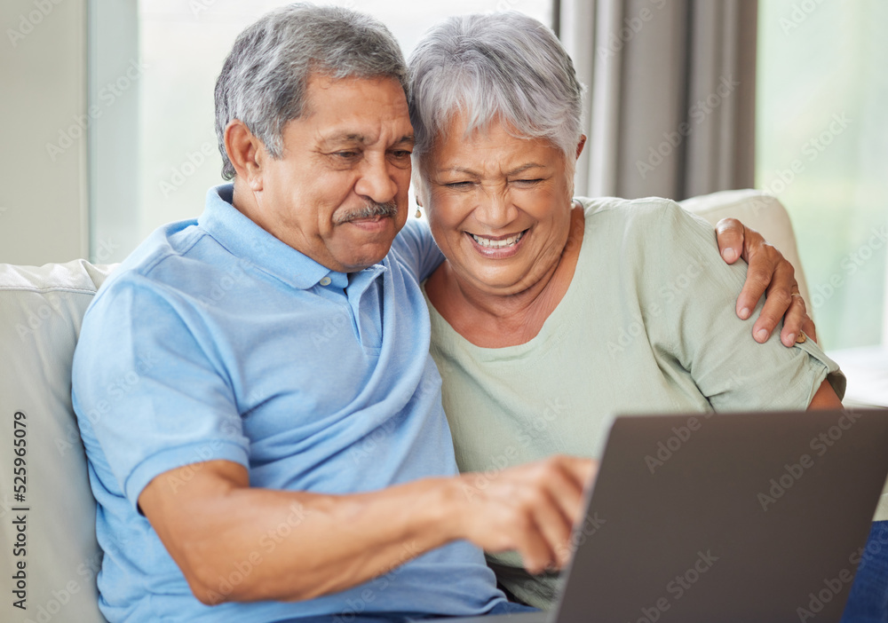 Elderly couple laptop on video call, social media or internet on their laptop on living room sofa. Relax senior man and woman watching or reading news, email or funny message online together at home