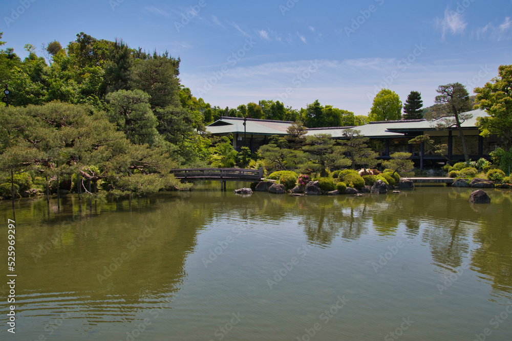 The stone bridge and the garden pond of Shinen inside the Heian-Jingu shrine. Kyoto Japan
The stone bridge and the garden pond of Shinen inside the Heian-Jingu shrine. Kyoto Japan