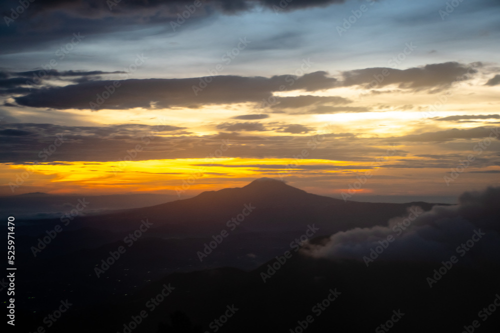 Sunrise at the peak of Si Kunir in the Dieng Plateau, Wonosobo, Central Java Indonesia
