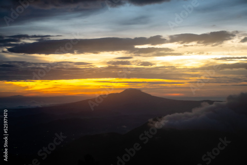 Sunrise at the peak of Si Kunir in the Dieng Plateau, Wonosobo, Central Java Indonesia 