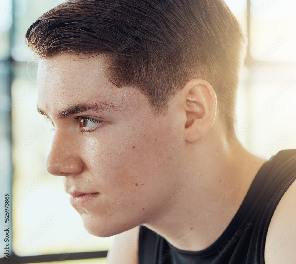 Obraz premium Thinking man face with motivation and focus in a room alone while focused on goal and determined. Headshot of young person with effort, pride and idea or mental vision to be a success in life