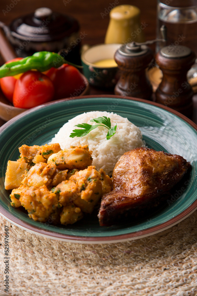 Roasted chicken with potato stew Peruvian comfort restaurant gourmet food