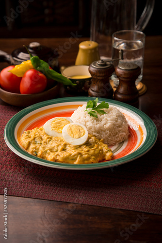 Aji de gallina chicken cream boiled eggs Peruvian comfort restaurant gourmet food