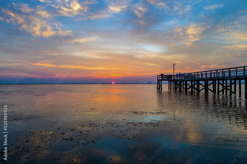 Pier at sunset on Mobile Bay