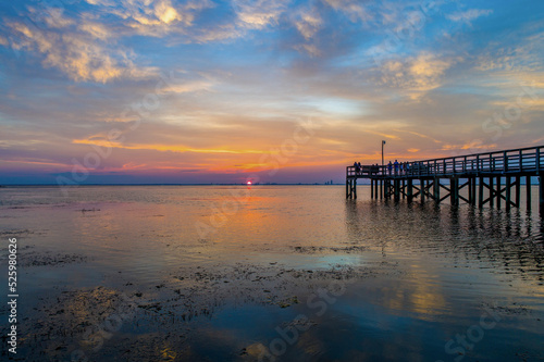 Pier at sunset on Mobile Bay
