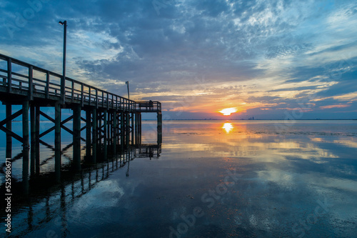 Pier on Mobile Bay at sunset
