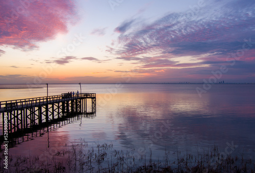 Pier on Mobile Bay at sunset