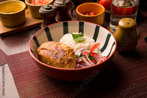 Papa rellena stuffed potato peruvian comfort restaurant gourmet food photo