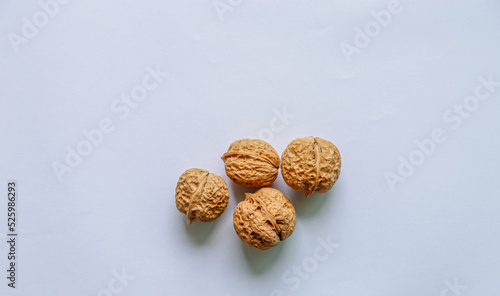 Group of dried walnuts on white background.