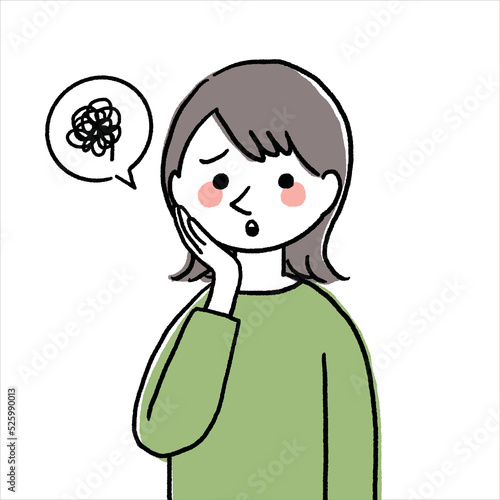 悩んでいるポーズの女性