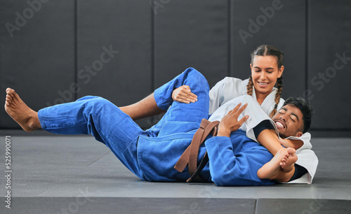 Принти на полотні Karate, judo and aikido fighters fighting to win in martial arts fight competition to train or practice skills