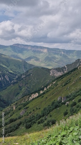 Fototapeta Naklejka Na Ścianę i Meble -  Blue sky, clouds and green mountain landscape
