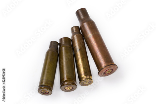 Spent shells different calibers from assault rifles on white background