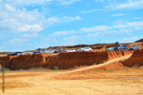 Wallpaper Mural Cars parked on a mountain of sand Torontodigital.ca