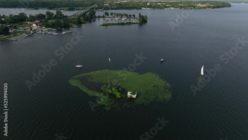 Zagrze Lake, Poland. Aerial View of Water Reservoir and Traffic on Coastal Road and Bridge, Drone Shot photo