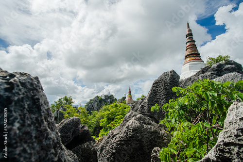 little white pagoda on mountain photo